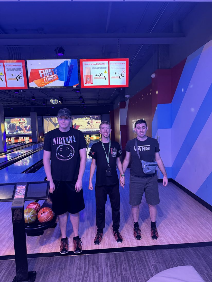 Clients bowling together